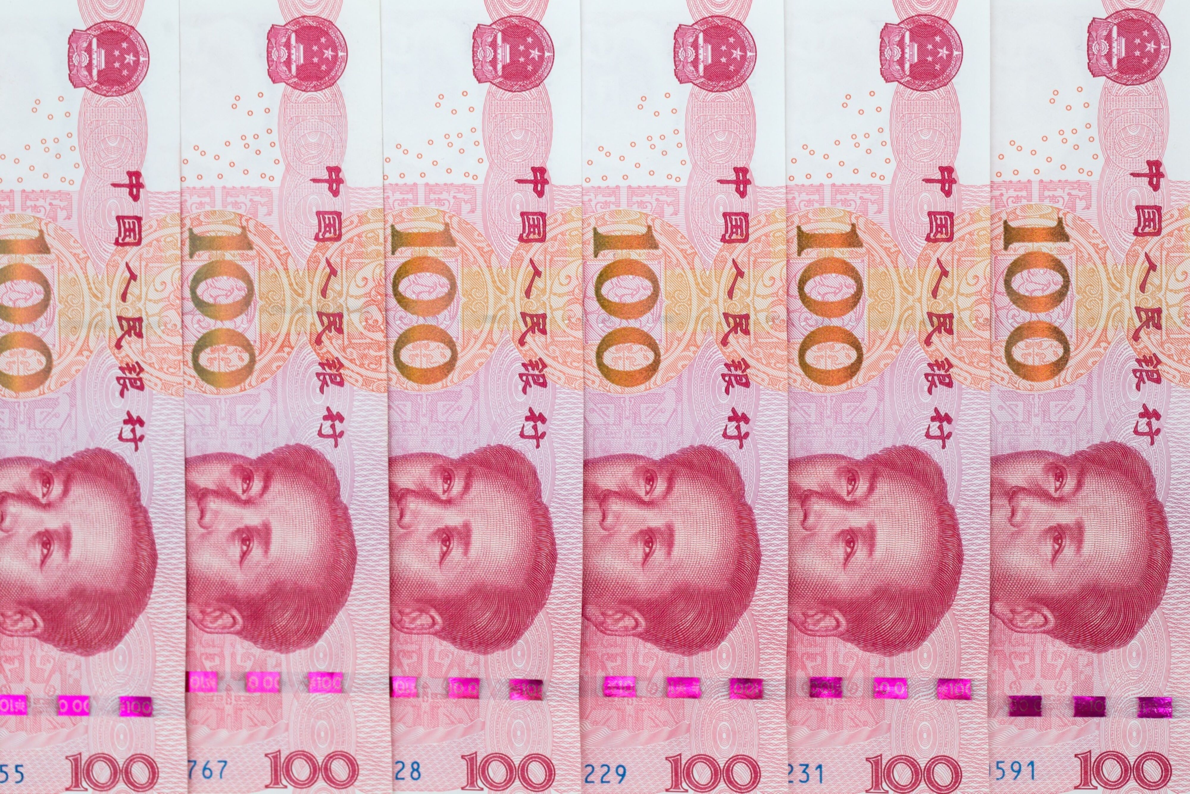 The catalyst for the yuan’s slide Friday was the PBOC’s decision to lower its daily reference rate for the managed currency by the most since early February. Photo: Bloomberg