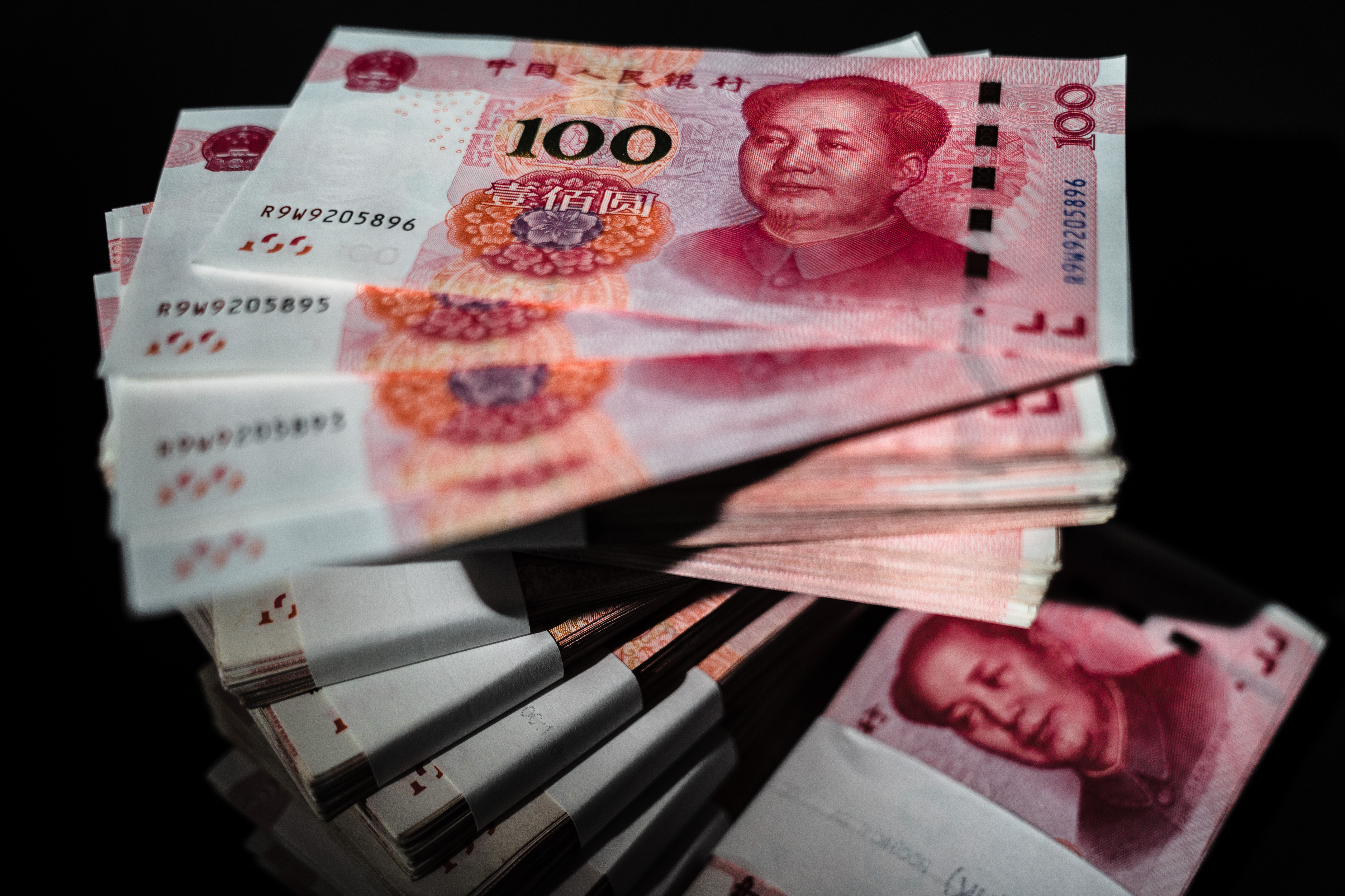 On Monday, the onshore yuan hit a five-month low, after a fresh round of hot U.S. inflation data bolstered the greenback and Treasury yields. Photo: Bloomberg