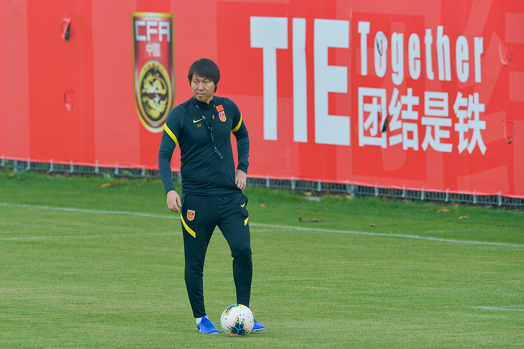 Li Tie, the former head coach of China’s national men’s soccer team, prepares to lead players in practice in Shanghai in May 2020. Photo: VCG