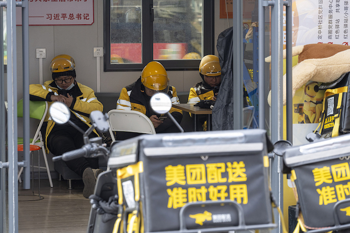 Meituan’s delivery drivers in Xiangyang, Hubei province, on March 3, 2024