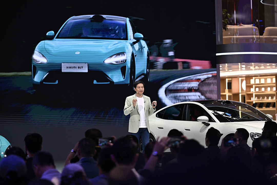 Xiaomi CEO Lei Jun gives a speech at the Beijing International Automotive Exhibition on Thursday. Photo: VCG