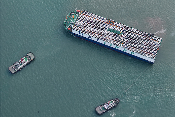 A ship loaded with vehicles for export departs from Yantai Port in Shandong province on March 11, 2024.